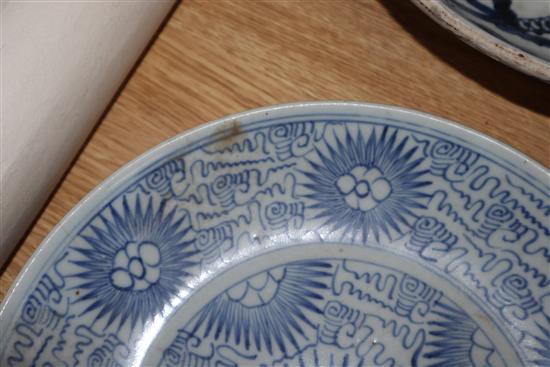 A Chinese blue and white deep plate decorated with a dragon and two other items